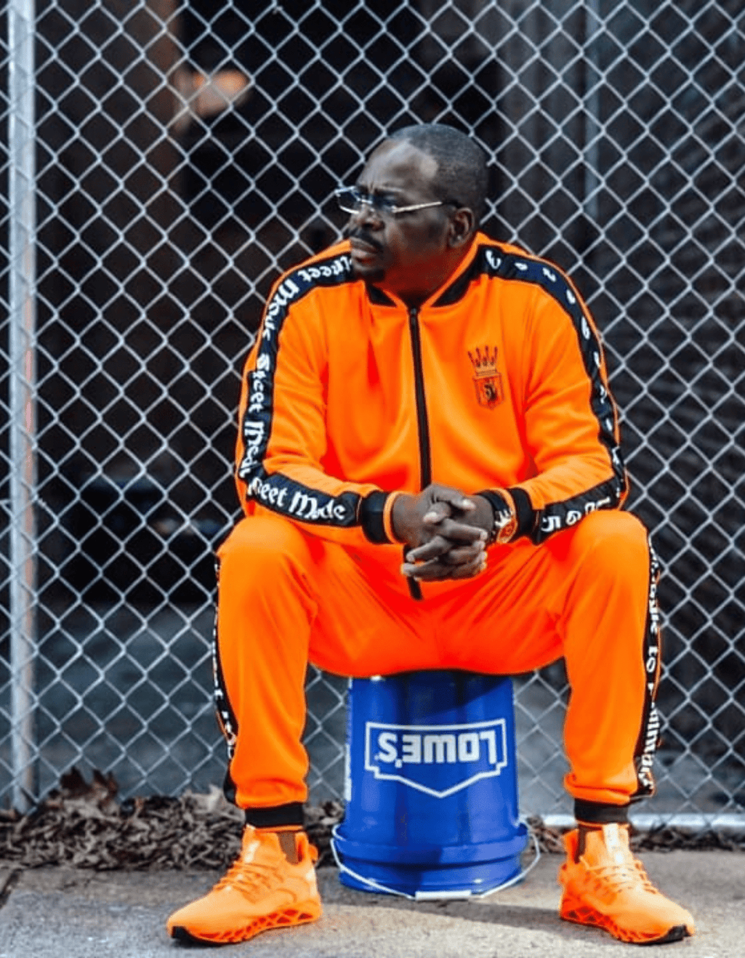 Orange and top black tracksuit